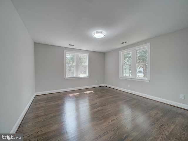 401 Bryan Point Rd, Accokeek, MD 20607 - spare room featuring healthy amount of natural light and dark wood-type flooring