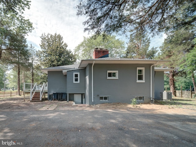 401 Bryan Point Rd, Accokeek, MD 20607 - back of property featuring a chimney and a deck