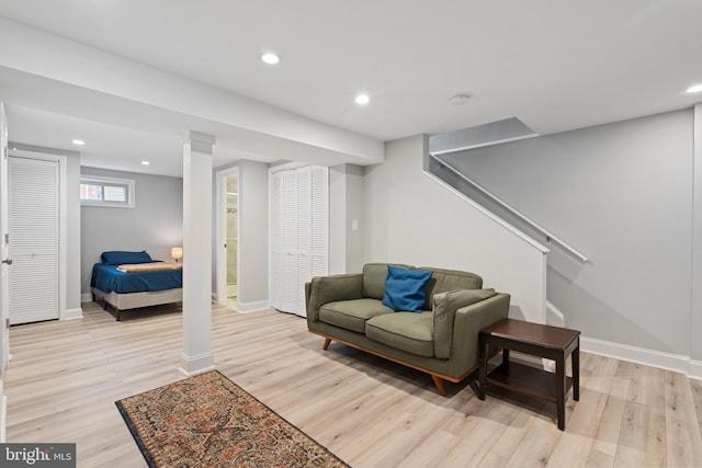 5054 8th St NE, Washington, DC 20017 - living room featuring light wood-style floors, baseboards, recessed lighting, and stairs