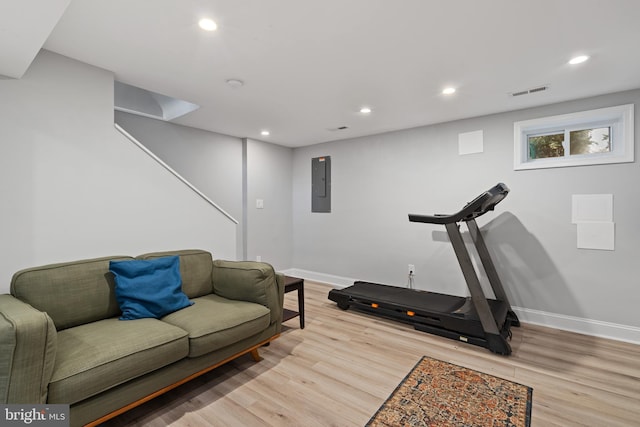 5054 8th St NE, Washington, DC 20017 - workout room with wood finished floors, electric panel, baseboards, and recessed lighting