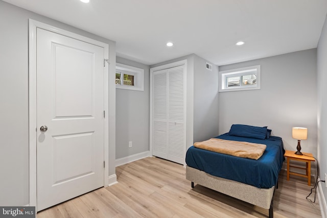 5054 8th St NE, Washington, DC 20017 - bedroom with light wood-style flooring, recessed lighting, a closet, and baseboards