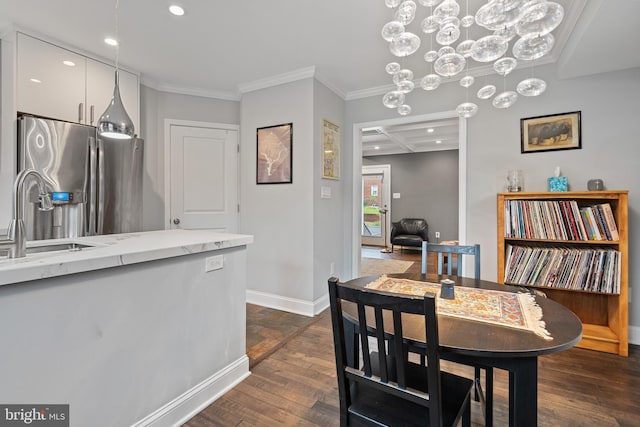 5054 8th St NE, Washington, DC 20017 - dining space with ornamental molding, recessed lighting, dark wood-type flooring, baseboards, and a chandelier