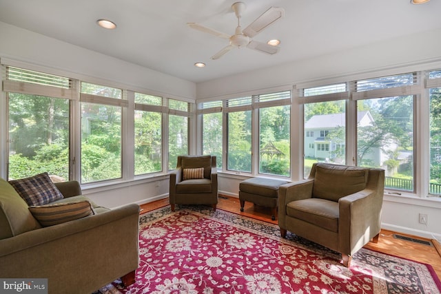 5811 Augusta Ln, Bethesda, MD 20816 - sunroom featuring healthy amount of natural light, baseboards, wood finished floors, and recessed lighting