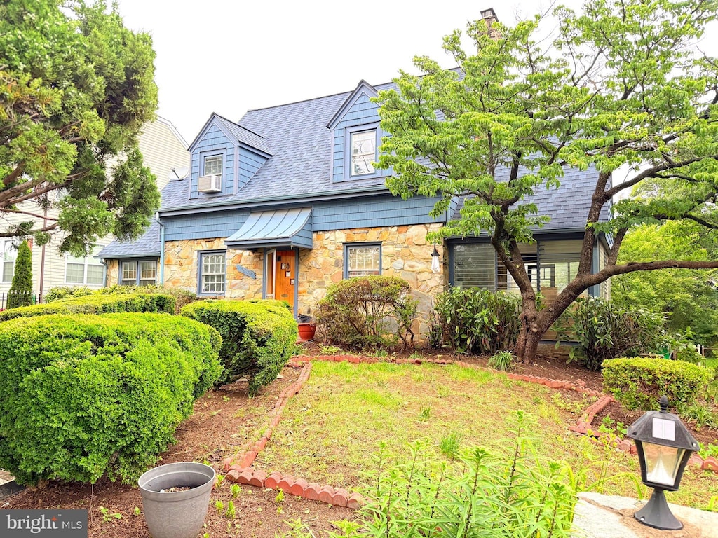 4633 Eastern Ave, Mount Rainier, MD 20712 - cape cod home featuring stone siding and a shingled roof