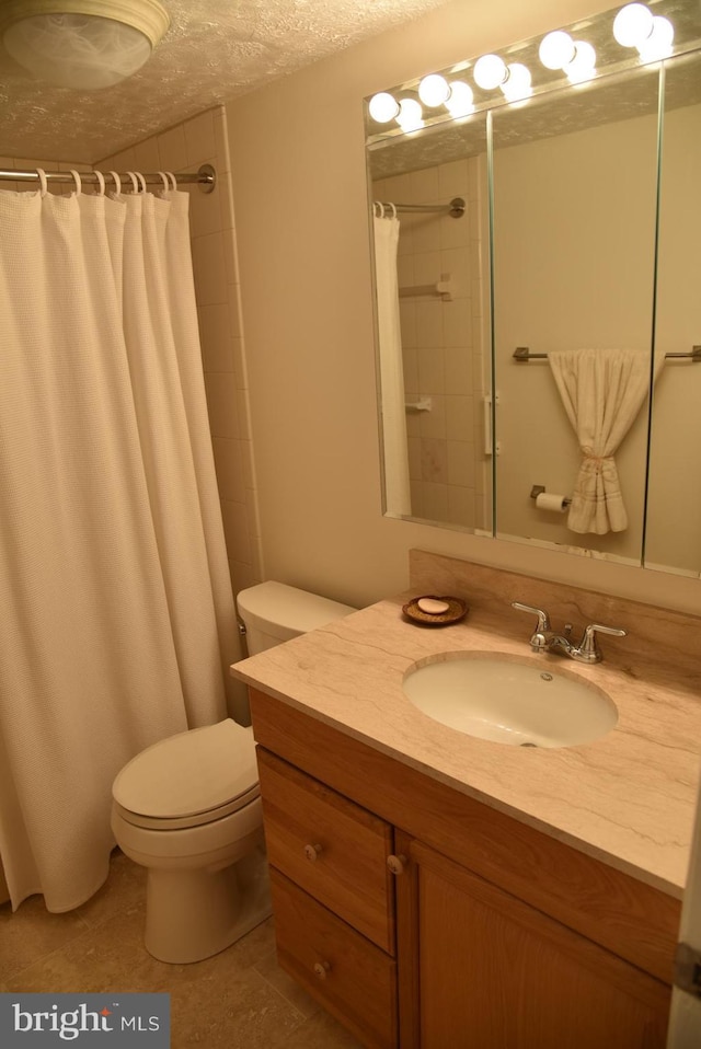 4360 Ivymount Ct Unit 32, Annandale, VA 22003 - full bathroom with vanity, toilet, and a tile shower