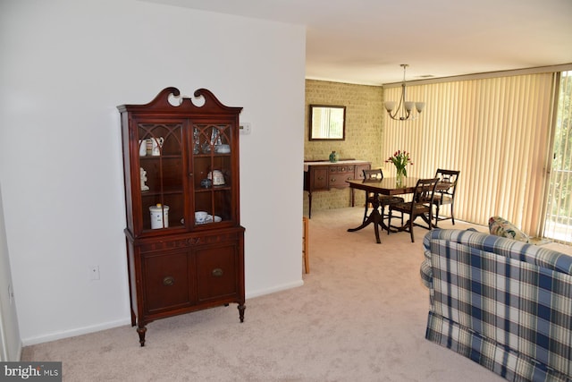 4360 Ivymount Ct Unit 32, Annandale, VA 22003 - dining room featuring light colored carpet, a chandelier, and baseboards