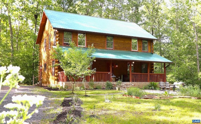 5254 Havenwood Ln, Schuyler, VA 22969 - log home featuring covered porch, metal roof, log exterior, and a front yard