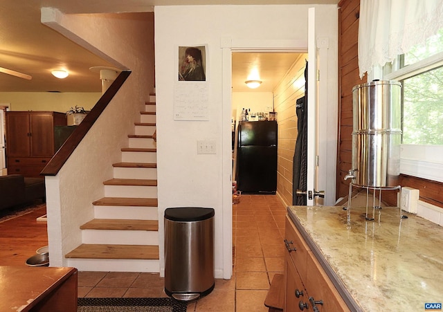 5254 Havenwood Ln, Schuyler, VA 22969 - staircase featuring tile patterned flooring and wooden walls