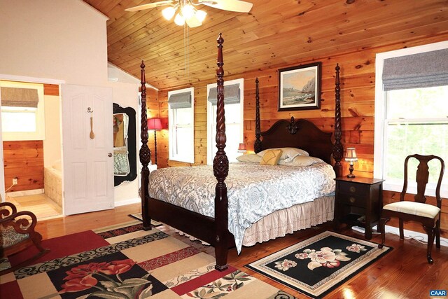 5254 Havenwood Ln, Schuyler, VA 22969 - bedroom featuring vaulted ceiling, multiple windows, wood finished floors, wood walls, and wood ceiling