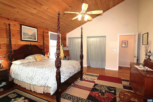 5254 Havenwood Ln, Schuyler, VA 22969 - bedroom featuring wooden ceiling, wood finished floors, high vaulted ceiling, wooden walls, and baseboards