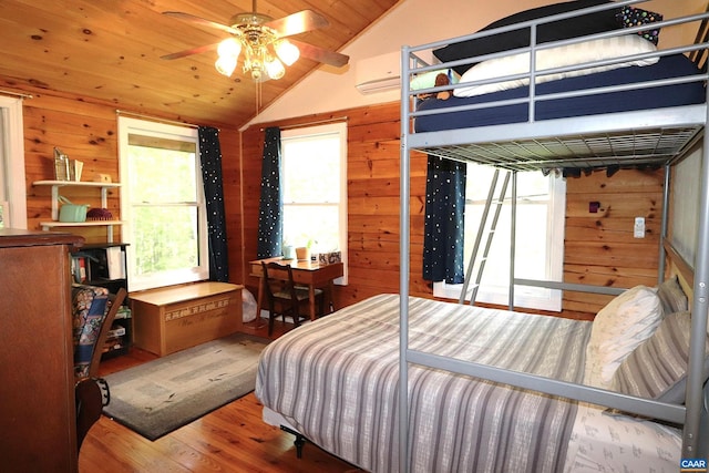 5254 Havenwood Ln, Schuyler, VA 22969 - bedroom featuring lofted ceiling, wood walls, wood finished floors, a wall unit AC, and wooden ceiling