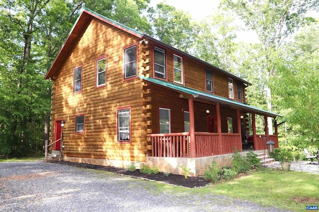 5254 Havenwood Ln, Schuyler, VA 22969 - view of front of house with log exterior and a porch