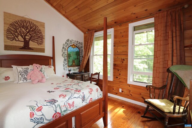5254 Havenwood Ln, Schuyler, VA 22969 - bedroom featuring lofted ceiling, light wood finished floors, wood ceiling, wood walls, and baseboards