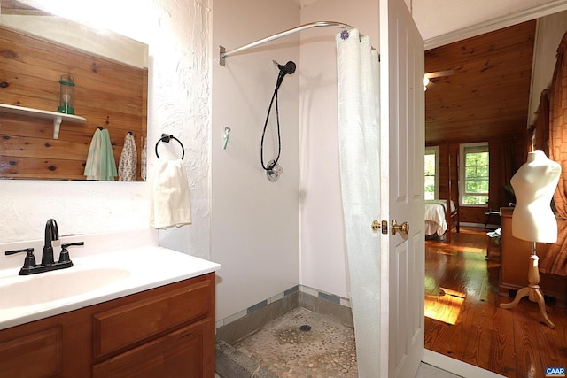 5254 Havenwood Ln, Schuyler, VA 22969 - ensuite bathroom featuring a shower stall, vanity, and wood finished floors