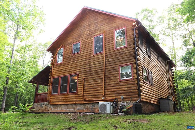 5254 Havenwood Ln, Schuyler, VA 22969 - view of property exterior with log exterior, a cooling unit, central air condition unit, and a yard