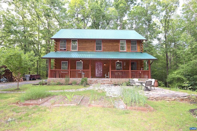 5254 Havenwood Ln, Schuyler, VA 22969 - log cabin with log exterior, covered porch, and a front lawn