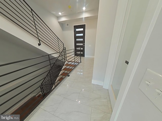 3143 W Montgomery Ave, Philadelphia, PA 19121 - foyer with light marble finish floors, baseboards, and recessed lighting
