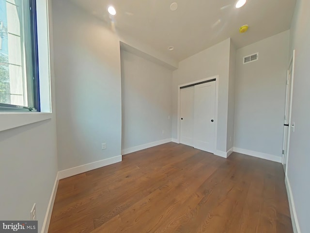 3143 W Montgomery Ave, Philadelphia, PA 19121 - unfurnished bedroom featuring wood finished floors, baseboards, a closet, and recessed lighting