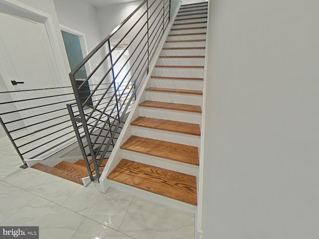 3143 W Montgomery Ave, Philadelphia, PA 19121 - staircase featuring marble finish floors