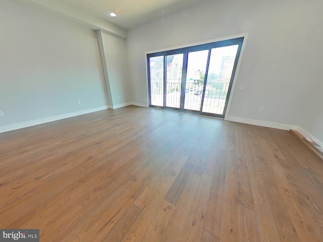 3143 W Montgomery Ave, Philadelphia, PA 19121 - unfurnished room with wood finished floors and baseboards