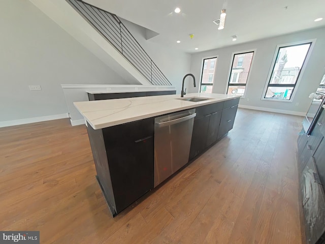 3143 W Montgomery Ave, Philadelphia, PA 19121 - kitchen with stainless steel dishwasher, a sink, a kitchen island with sink, baseboards, and recessed lighting