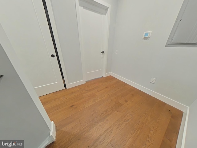 3143 W Montgomery Ave, Philadelphia, PA 19121 - unfurnished bedroom featuring baseboards, light wood-style flooring, and electric panel
