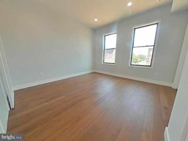3143 W Montgomery Ave, Philadelphia, PA 19121 - spare room featuring wood-type flooring, baseboards, and recessed lighting