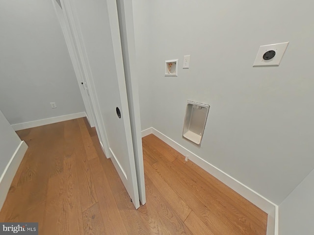 3143 W Montgomery Ave, Philadelphia, PA 19121 - laundry area featuring light wood-style floors, baseboards, and hookup for a washing machine