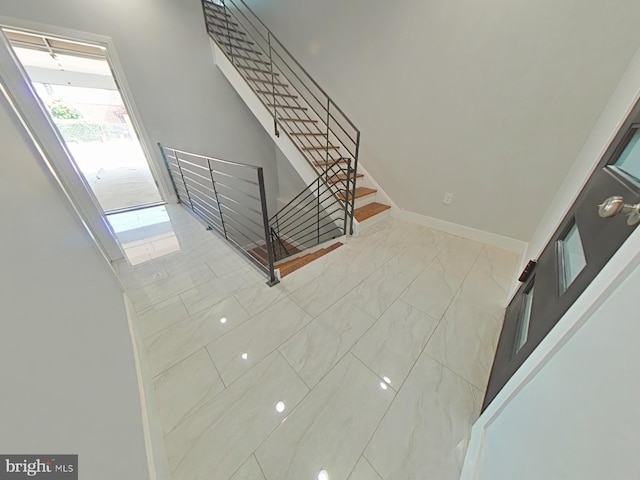 3143 W Montgomery Ave, Philadelphia, PA 19121 - stairs featuring marble finish floors and baseboards