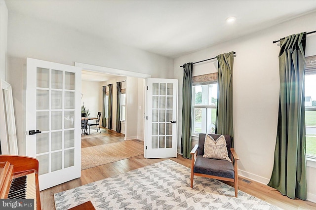 48 Winifred Dr, Hanover, PA 17331 - sitting room featuring french doors, wood finished floors, and baseboards