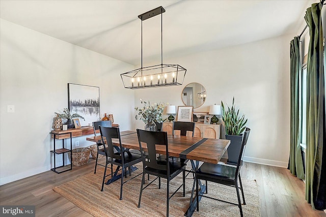 48 Winifred Dr, Hanover, PA 17331 - dining area with wood finished floors, a chandelier, and baseboards