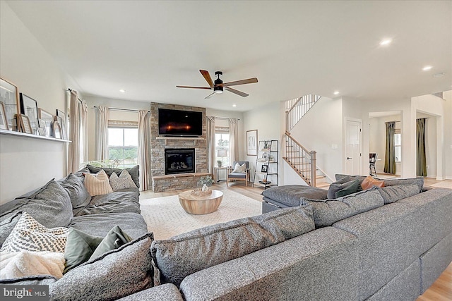 48 Winifred Dr, Hanover, PA 17331 - living room with stairs, light wood-type flooring, a ceiling fan, a stone fireplace, and recessed lighting