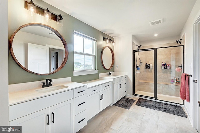 48 Winifred Dr, Hanover, PA 17331 - bathroom featuring double vanity, a stall shower, and recessed lighting