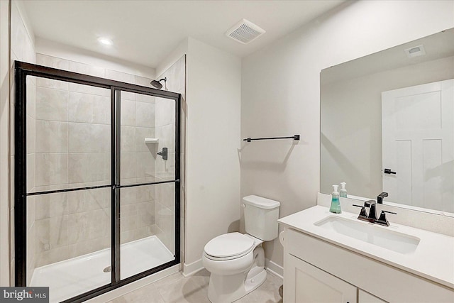 48 Winifred Dr, Hanover, PA 17331 - bathroom featuring toilet, vanity, a stall shower, baseboards, and recessed lighting