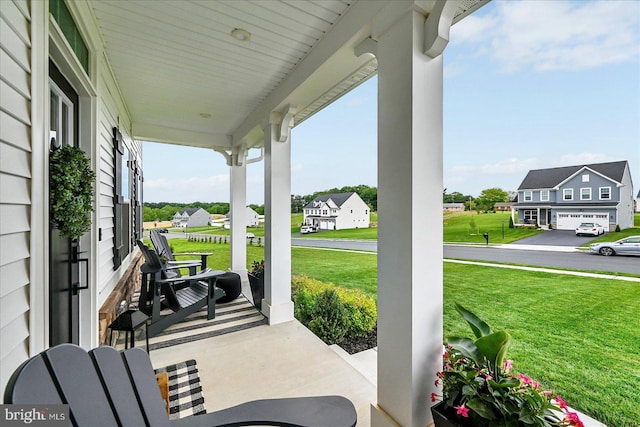 48 Winifred Dr, Hanover, PA 17331 - covered porch with a residential view and a lawn