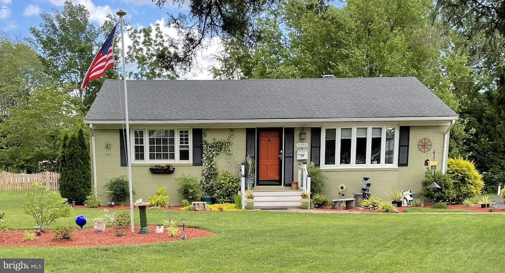9000 Sudley Rd, Manassas, VA 20110 - view of front of home with brick siding and roof with shingles
