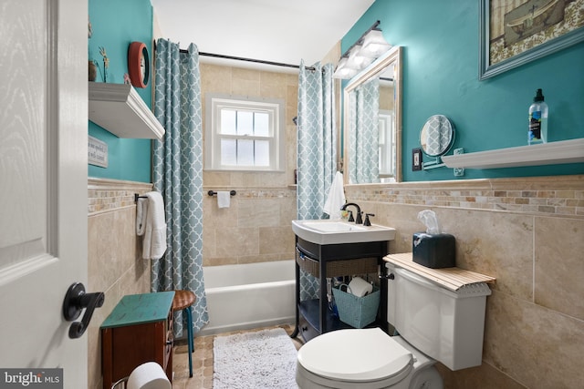 9000 Sudley Rd, Manassas, VA 20110 - full bath with tile walls, shower / bathtub combination with curtain, toilet, and vanity
