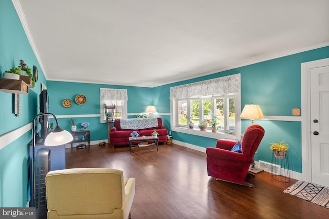 9000 Sudley Rd, Manassas, VA 20110 - living room featuring healthy amount of natural light, crown molding, wood finished floors, and baseboards