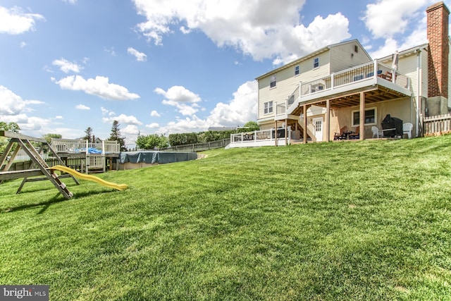 4 John Mar Ct, Mechanicsburg, PA 17055 - view of grassy yard featuring a wooden deck and stairs