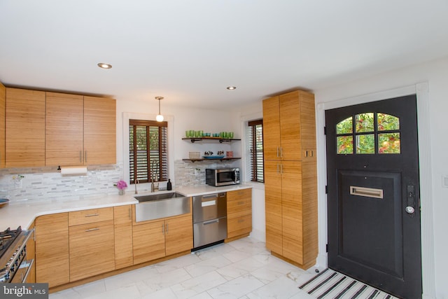 72 N Franklin St Unit A, Lambertville, NJ 08530 - kitchen with stainless steel appliances, a sink, light marble finish flooring, plenty of natural light, and recessed lighting