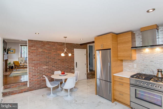 72 N Franklin St Unit A, Lambertville, NJ 08530 - kitchen with stainless steel appliances, wall chimney exhaust hood, light countertops, decorative backsplash, and brick wall
