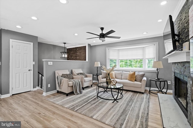 4 Hawkesbury Ct, Newark, DE 19702 - living room featuring baseboards, light wood-style floors, recessed lighting, a stone fireplace, and a ceiling fan