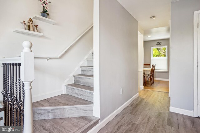 2557 Peter Jefferson Ln, Herndon, VA 20171 - stairs with wood finished floors and baseboards