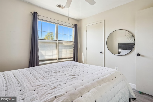 2557 Peter Jefferson Ln, Herndon, VA 20171 - bedroom featuring wood finished floors, baseboards, a closet, and ceiling fan