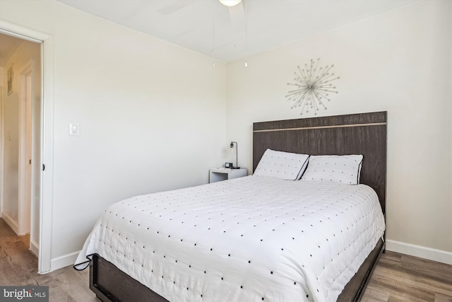 2557 Peter Jefferson Ln, Herndon, VA 20171 - bedroom with wood finished floors, baseboards, and a ceiling fan