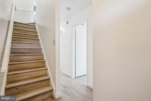 2557 Peter Jefferson Ln, Herndon, VA 20171 - staircase featuring baseboards and wood finished floors