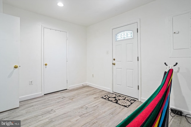 2557 Peter Jefferson Ln, Herndon, VA 20171 - foyer entrance with electric panel, wood finished floors, baseboards, and recessed lighting