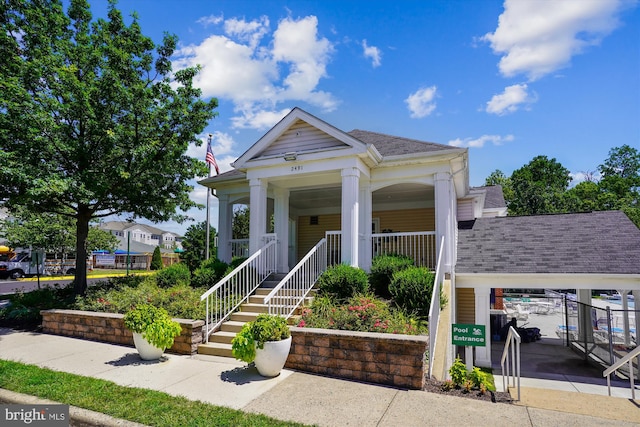 2557 Peter Jefferson Ln, Herndon, VA 20171 - view of front of property with a shingled roof and covered porch