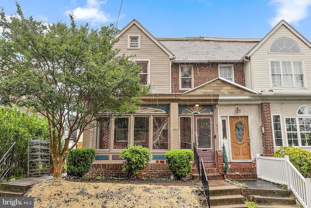 907 W Twenty Fifth St, Wilmington, DE 19802 - view of front of home featuring brick siding, a high end roof, and entry steps