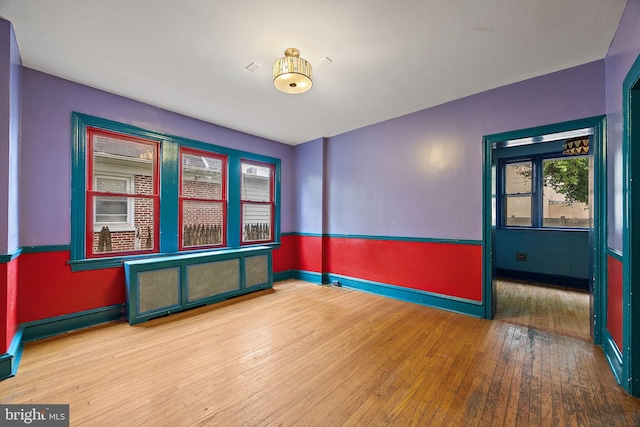 907 W Twenty Fifth St, Wilmington, DE 19802 - spare room featuring wood-type flooring and baseboards